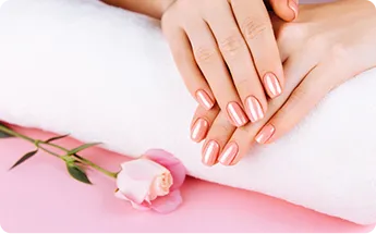 female hands with pink manicure